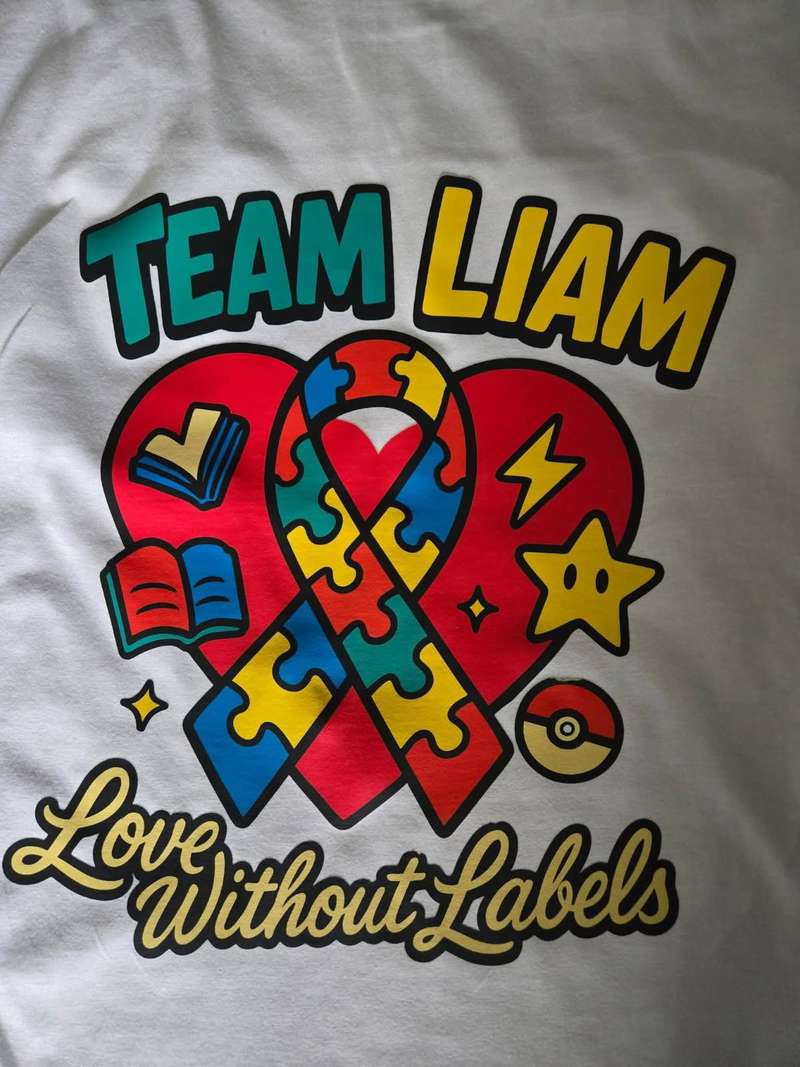 The Roof Revivers team Liam T-shirt for the 2025 Autism Speaks event.