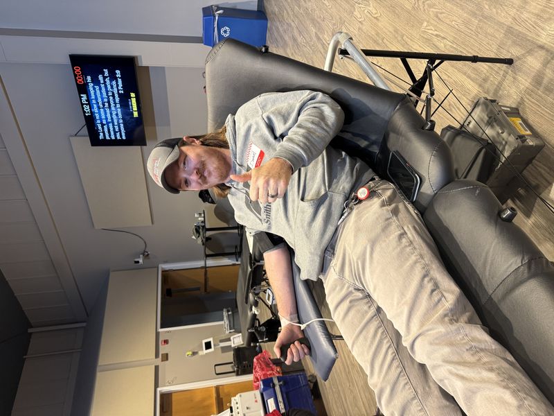 Dan of Rood Revivers makes a blood donation at the 2025 blood drive.