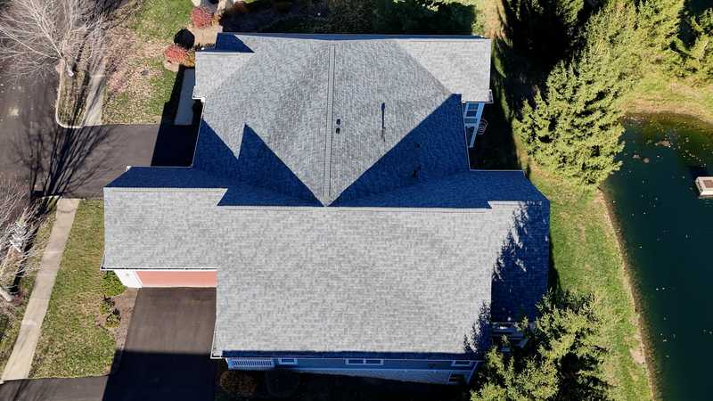 Storm damaged roof replaced and repaired by Roof Revivers of Columbus, Ohio.